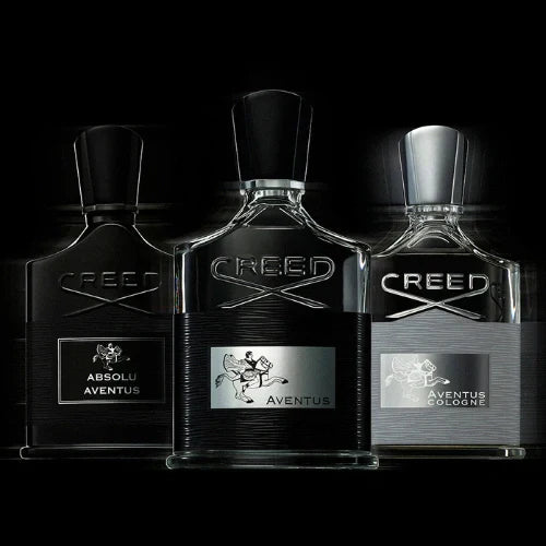 A trilogy of Aventus perfume bottles, Aventus For Her and Aventus Cologne