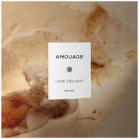 Amouage Love Delight perfume box on a white background