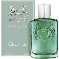 Parfums de Marly Greenley Eau de Parfum bottle in translucent emerald-green glass with an embossed horse crest and silver cap on a white background.